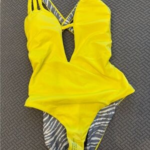 Butter yellow Becca reversible bathing suit. Never worn tags attached.